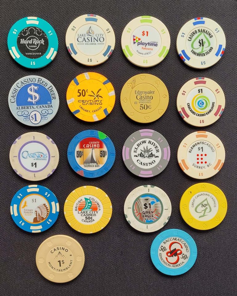 A colorful collection of casino chips from blackjack tables across Canada, representing casinos from different provinces.